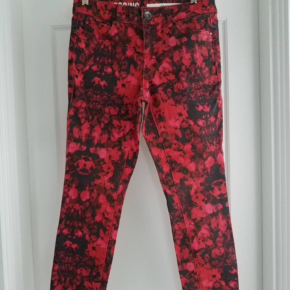 Red flowered denim skinny jeans by DKNY